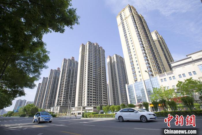 資料圖：車輛從一樓盤前經(jīng)過。 <a target='_blank' href='/'><p  align=