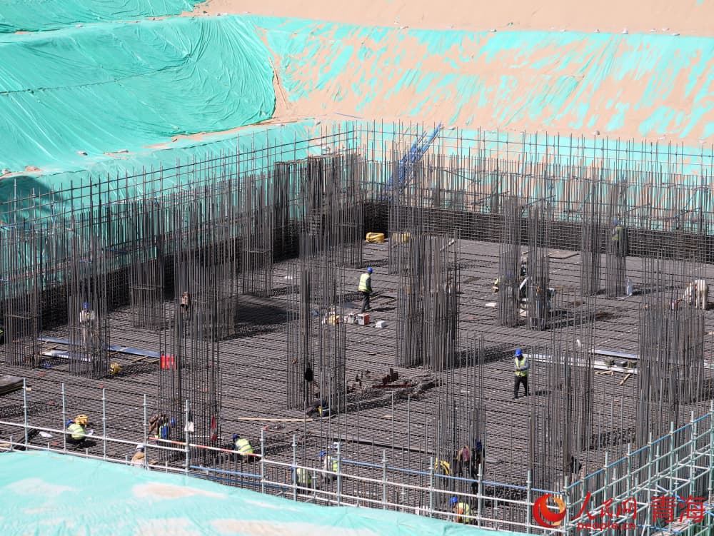 華電2×66萬千瓦煤電項目施工。人民網(wǎng) 況玉攝